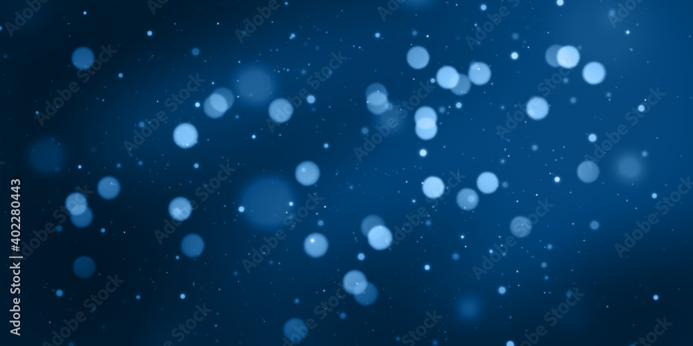 Blue abstract background with bokeh lights and stars.