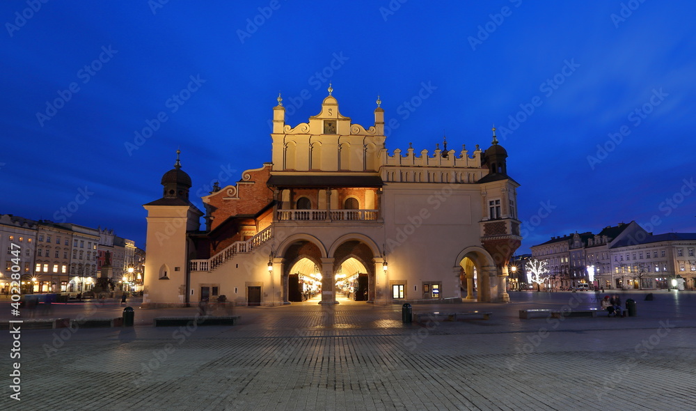  Cityscape of Krakow old town, Poland, main market square with building called Sukiennice in Polish
