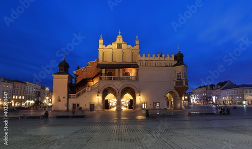  Cityscape of Krakow old town, Poland, main market square with building called Sukiennice in Polish 