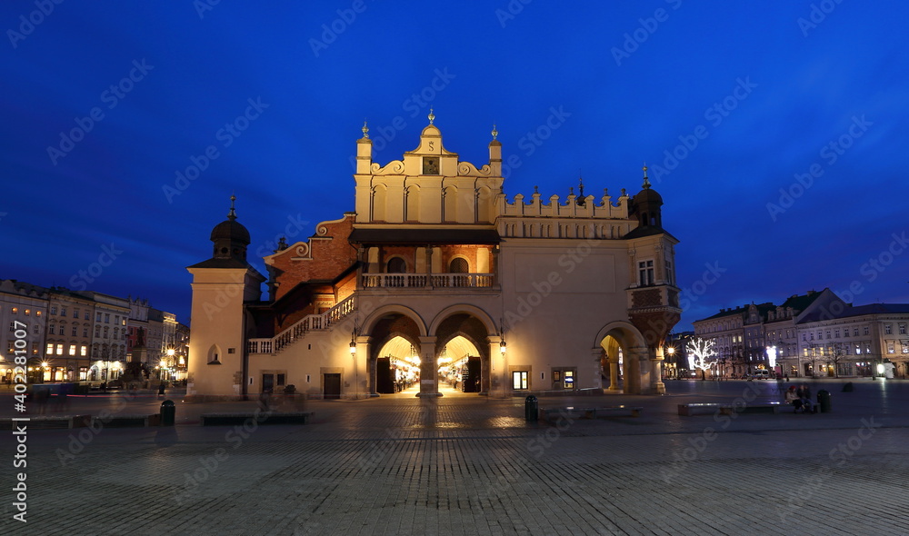 Night cityscape Krakow Poland, main market square with historical buildings