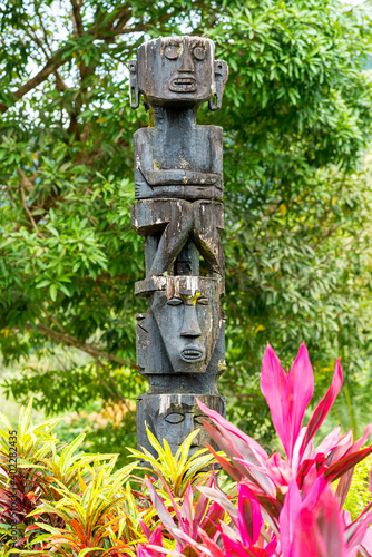 Totem pole in the Sarawak Cultural Village in the north of Kuching on the Santubong peninsula. It showcases the various ethnic groups and local culture of the tribes of Sarawak photo