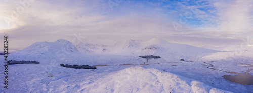 A view of Lochan na h-Achlaise on rannoch moor in the argyll region of the highlands of Scotland during a winter day near glen coe