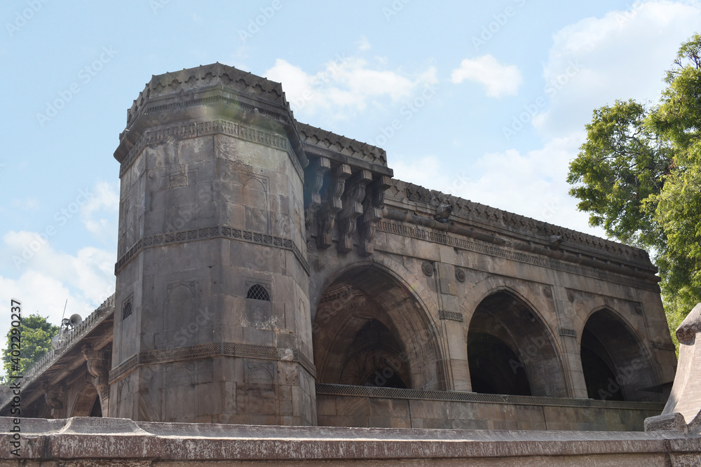 Left side view - The Sidi Saiyyed Mosque in Ahmedabad, Gujarat is a sublime ode in stone to the extraordinary architectural legacy of the African diaspora in India