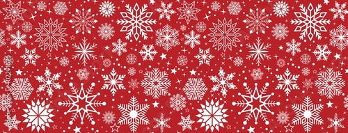 Nahtlos Weihnachten vektor mit Schneeflocken und Sterne. Roter Hintergrund.