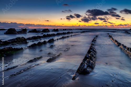 Barrika wild beach at sunset, Biscay, Basque Country, Spain.