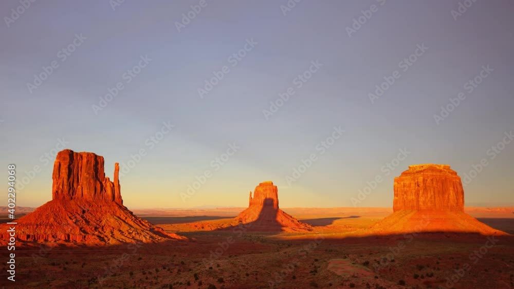 Time Lapse of beautiful clouds behind the rock formations of Monument Valley as the sun sets. Time Lapse of beautiful clouds behind the rock formations of Monument Valley as the sun sets.