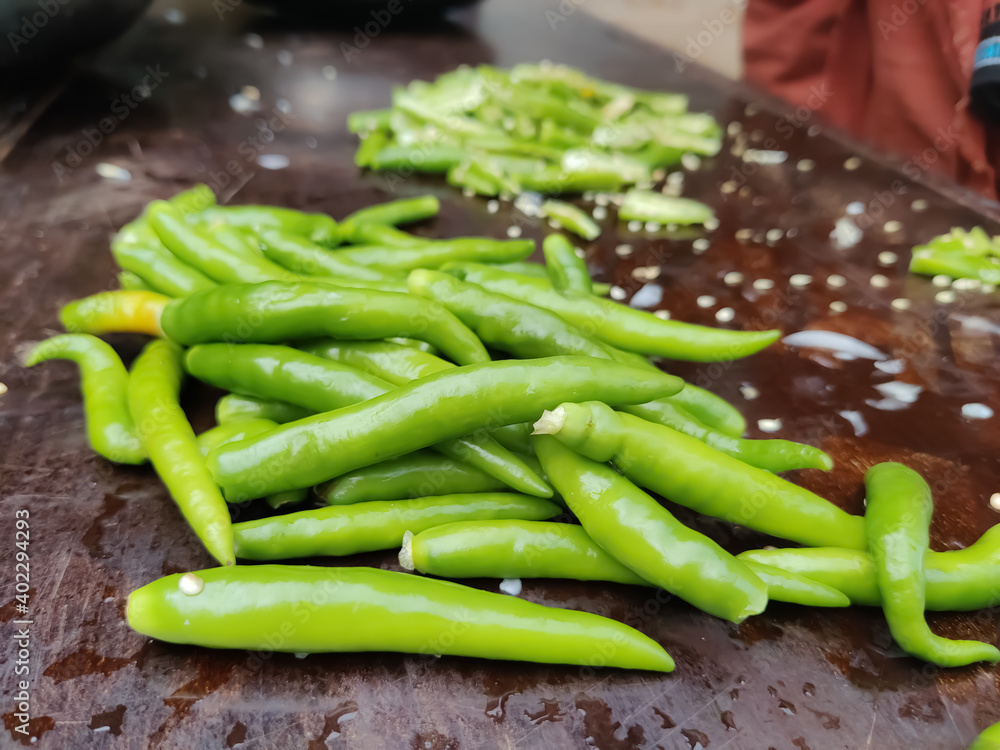 Delicious Green chili peppers on the table Delicious Green chili peppers on the table