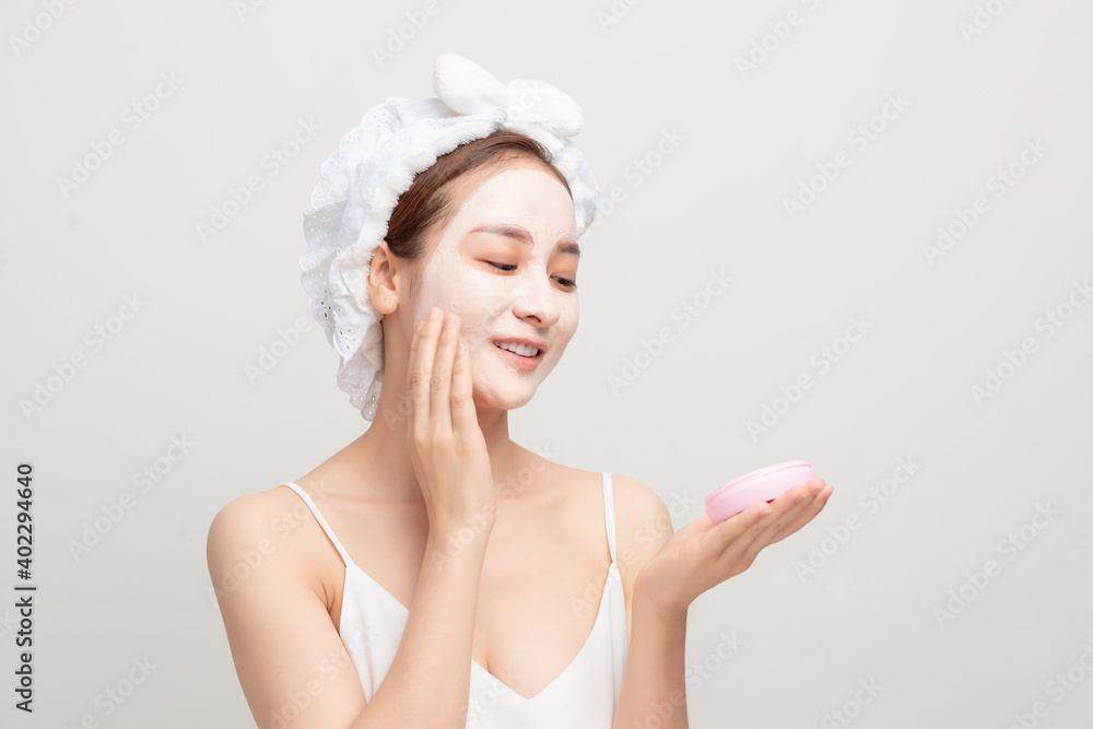 beautiful girl in the bathroom and mask for facial skin care beautiful girl in the bathroom and mask for facial skin care