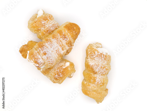 cream horn or schamroll traditional sweet europe cake with white background