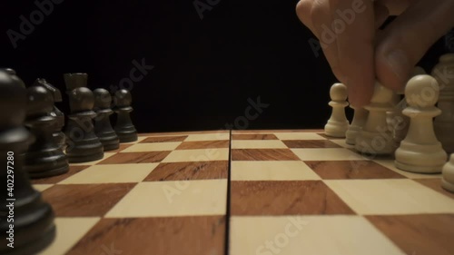 The players are playing a chess game