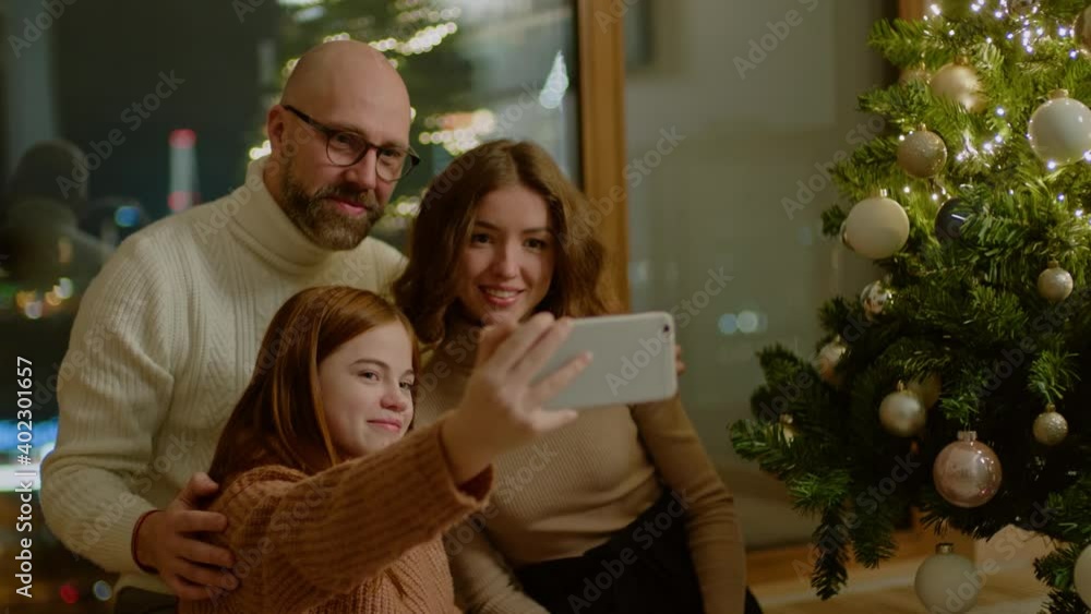 Charming Family Take Selfie Together on Smartphone Charming Family Take Selfie Together on Smartphone