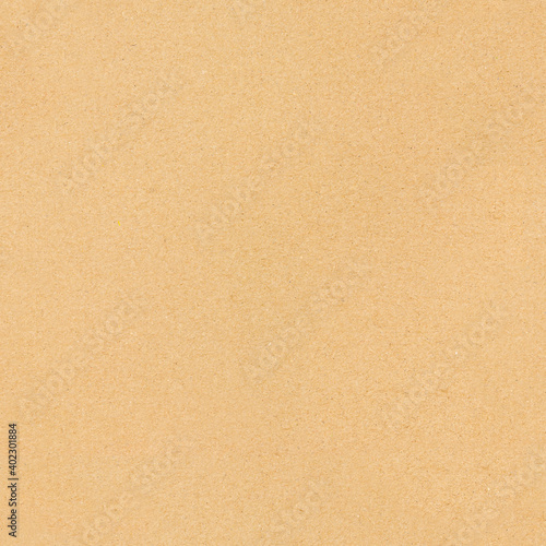 Paper texture cardboard background. Closeup on a rough paper or cardboard sheet.