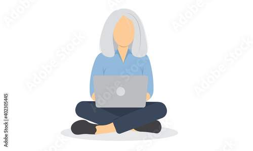 Seated elderly woman with laptop