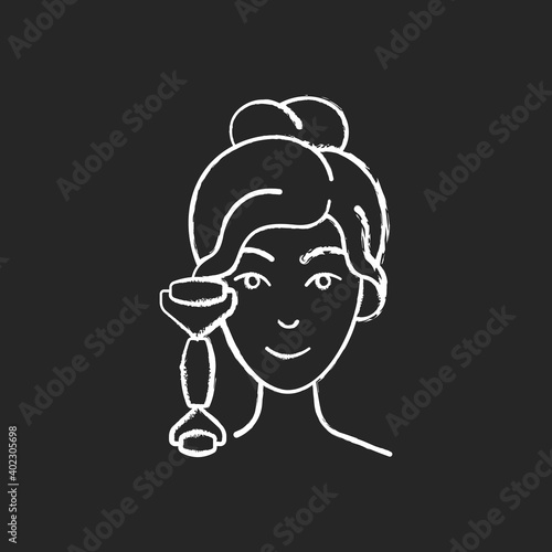 Quartz facial roller chalk white icon on black background. Reducing inflammation. Promoting wound healing. Preventing puffiness, wrinkles under eyes. Isolated vector chalkboard illustration