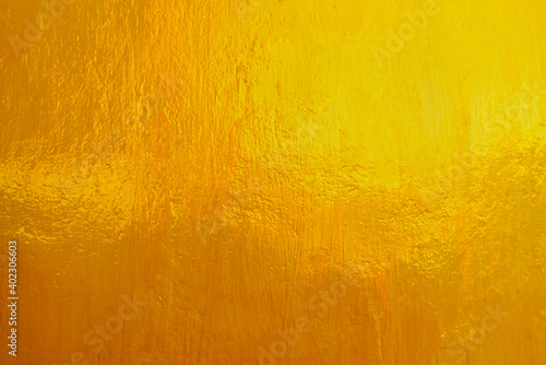 Gold texture background with shiny glitter on rough texture