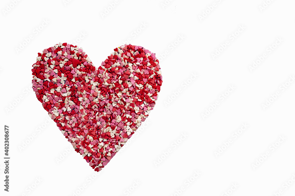 close up confetti in the shape of hearts on a pink background copy space. happy valentine's day concept