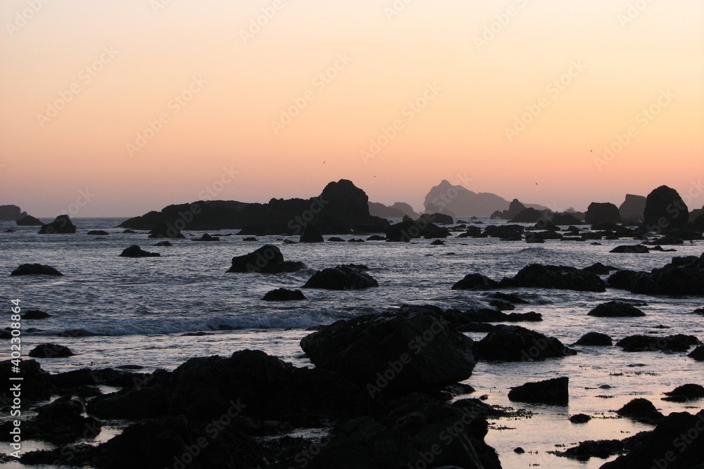 California sunrise with rock silhouette  