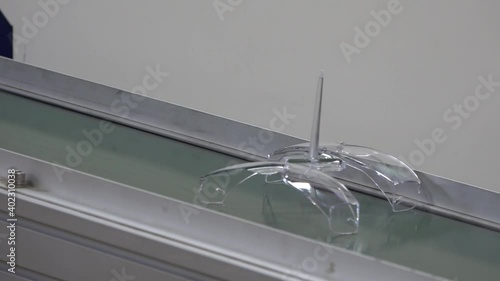 Equipment for the production of plastic glasses for safety glasses.