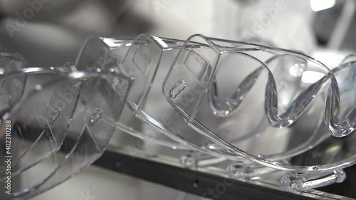 Equipment for the production of plastic glasses for safety glasses.