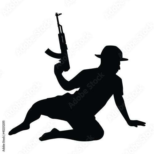 Young boy soldier with weapon silhouette vector