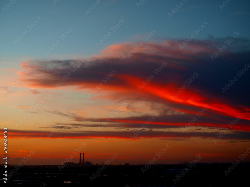 Colorful clouds over coal-burning power plant