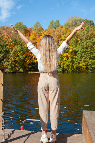 girl with loose hair on the lake