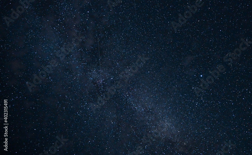 Colorful shot of the milky way with small clouds. Astrophotography