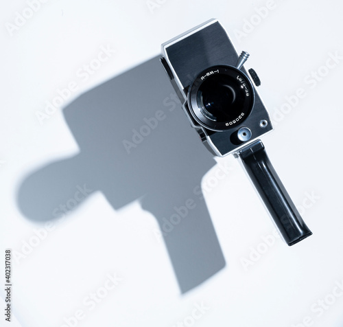 80s movie camera view from above on a white background with a shadow
