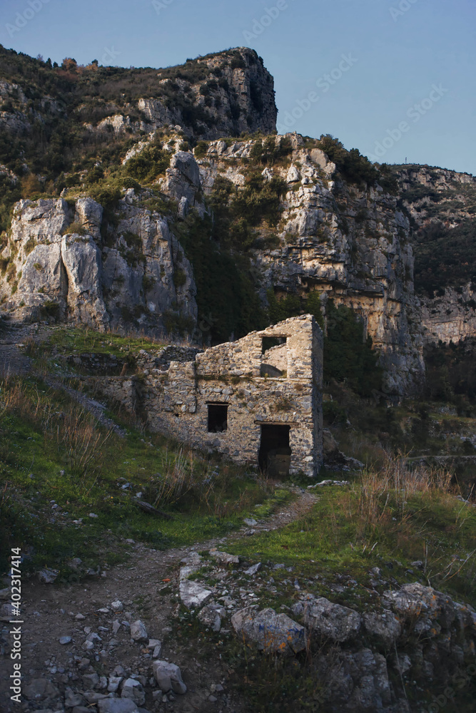Ruins of a stone house at susnet,  along the spectacular the path of the gods (Sentiero Degli Dei), southern Italy ,Campania  region.