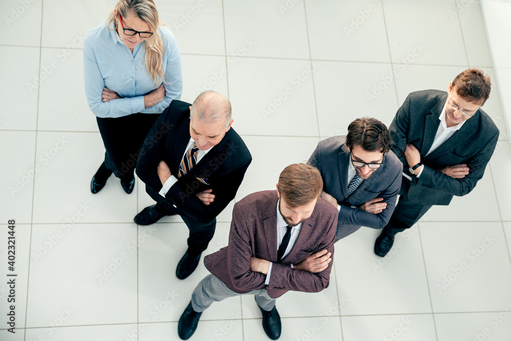 top view. a team of diverse professional employees standing together.