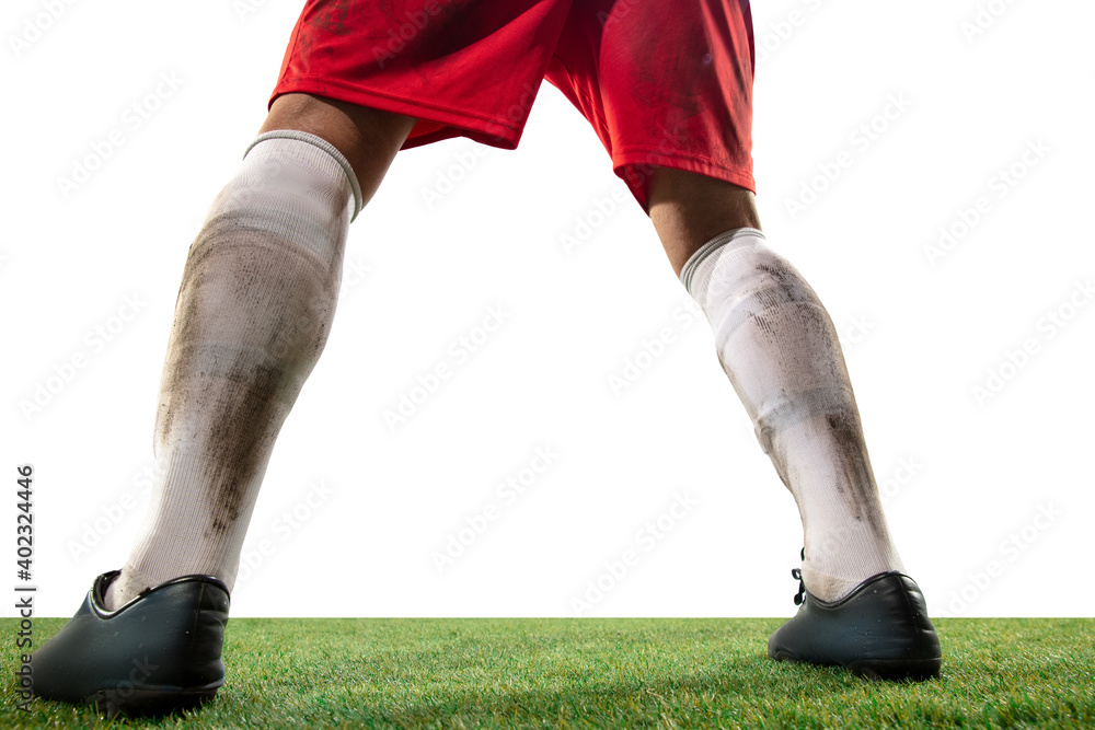 Fototapeta premium Attacking. Close up legs of professional soccer, football player fighting for ball on field isolated on white background. Concept of action, motion, high tensioned emotion during game. Cropped image.