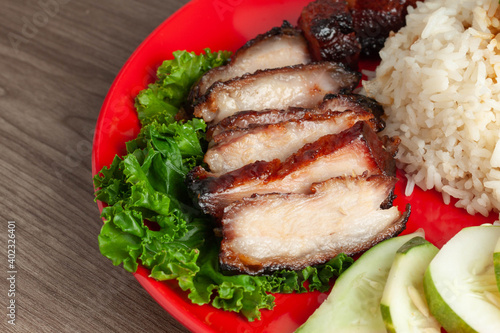 Chinese BBQ pork rice, is one of the most popular pork recipes in Cantonese cooking. photo