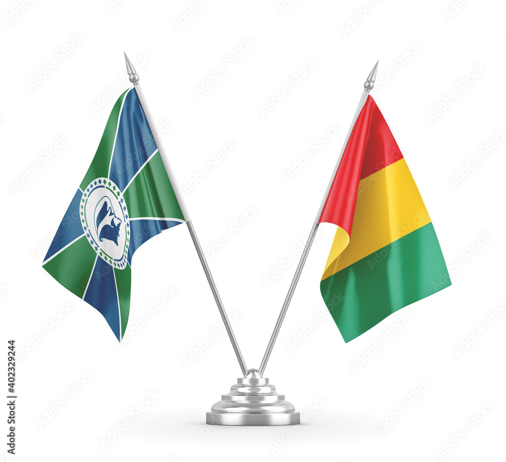 Guinea and Martinique table flags isolated on white 3D rendering Guinea and Martinique table flags isolated on white 3D rendering