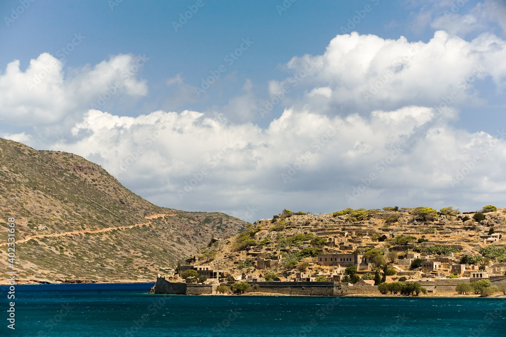view of The island of Spinalonga (Kalydon) in a sunny day,  in the Gulf of Elounda,  north-eastern of Crete island, Greece, Europe.