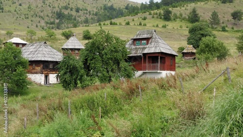 Ancient Houses At Sopotnica Village On Jadovnik Mountain In Serbia - aerial drone shot photo