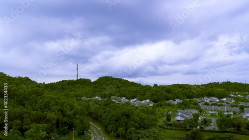 4K UHD Cinematic timelapse footage view of 5G Communication tower during morning sunrise with clouds, mists and fog