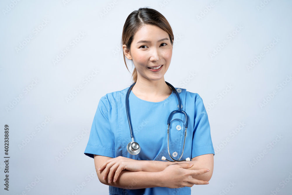 Portrait of young Asian nurse in a blue uniform, Isolated on white background. Portrait of young Asian nurse in a blue uniform, Isolated on white background.