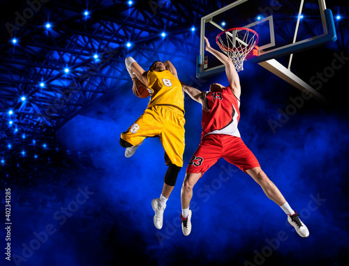 Two basketball players in action