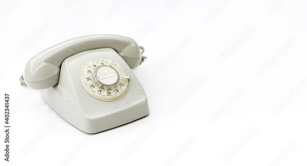 Retro desktop telephone isolated on a white background. Space for text. Communications concept. Retro desktop telephone isolated on a white background. Space for text. Communications concept.