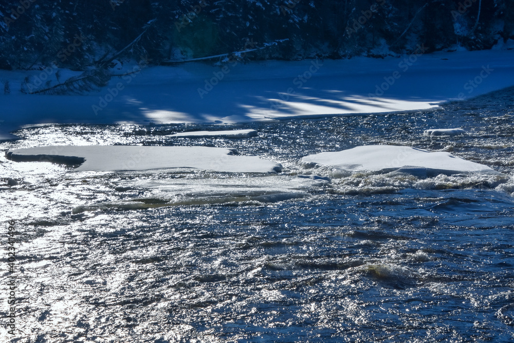 Icy river in the Canadian winters in Quebec Icy river in the Canadian winters in Quebec