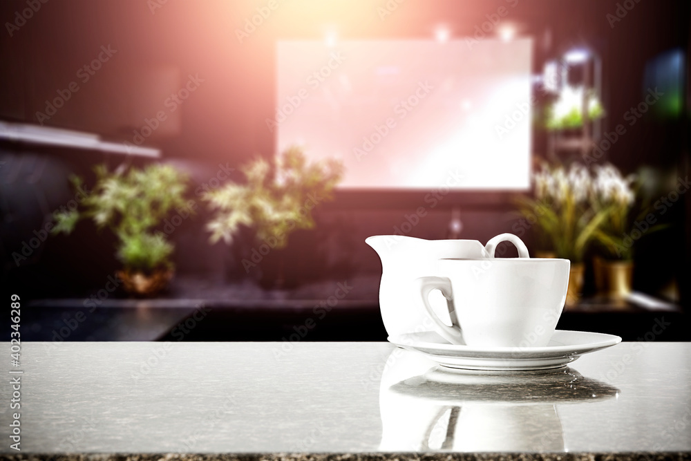 Obraz premium Wooden table in the kitchen with kitchen attributes with a free space for an advertising product