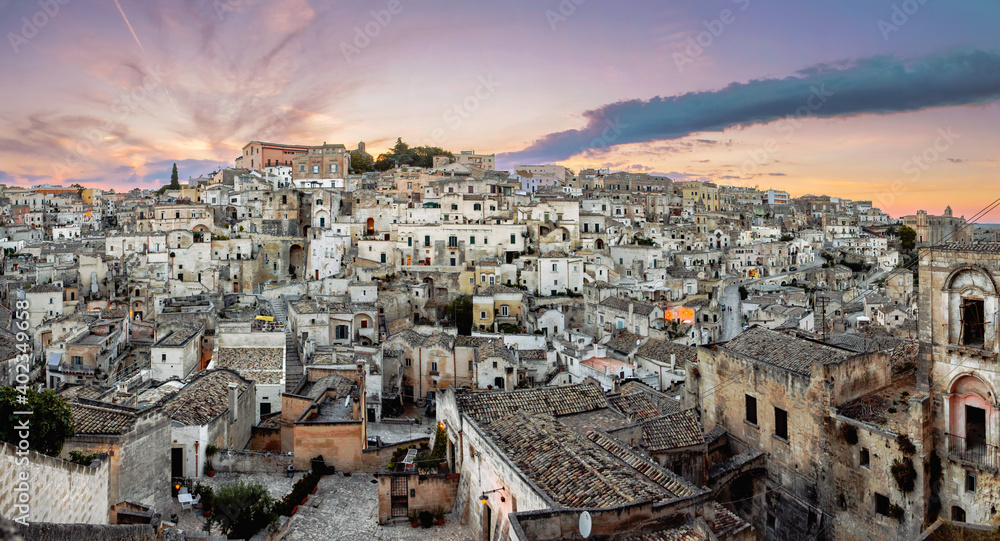 Panoramic view of the famous ancient stone city of Matera at sunset. Basilicata, Italy.