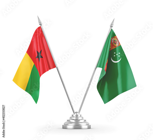 Turkmenistan and Guinea-Bissau table flags isolated on white 3D rendering