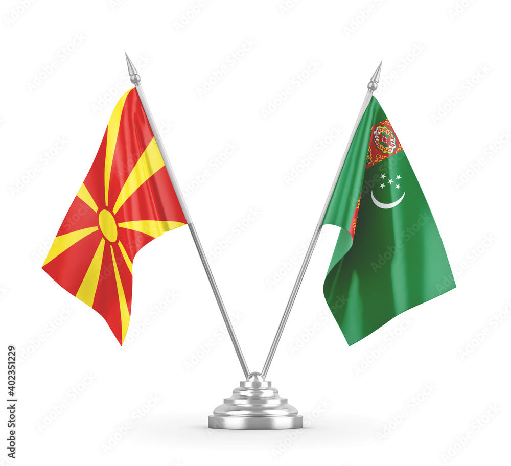 Turkmenistan and North Macedonia table flags isolated on white 3D rendering Turkmenistan and North Macedonia table flags isolated on white 3D rendering