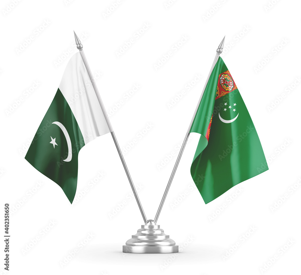 Turkmenistan and Pakistan table flags isolated on white 3D rendering Turkmenistan and Pakistan table flags isolated on white 3D rendering