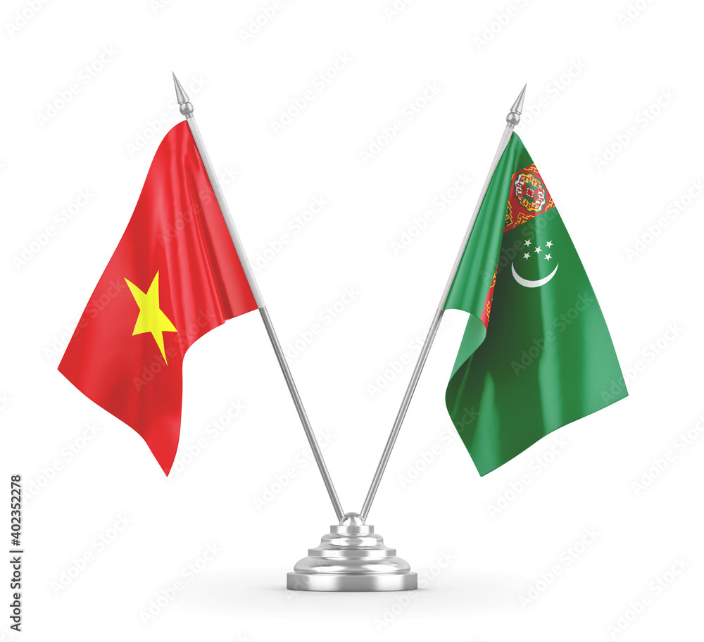 Turkmenistan and Vietnam table flags isolated on white 3D rendering Turkmenistan and Vietnam table flags isolated on white 3D rendering