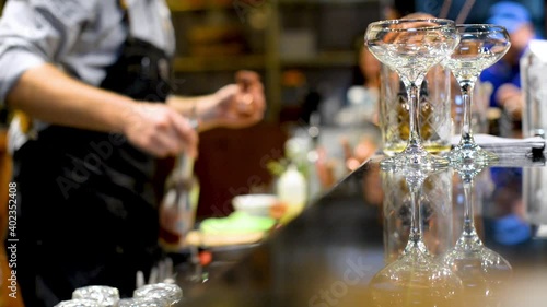 Bartender praparing fancy drink on bar counter photo