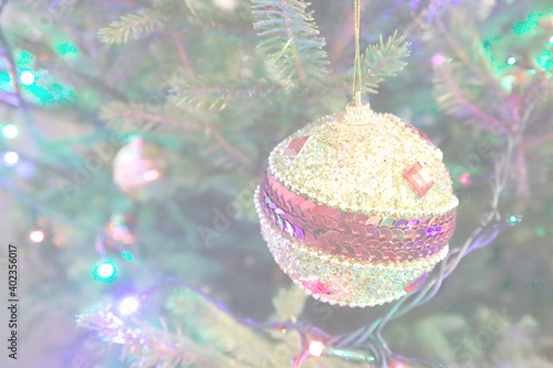 Christmas tree with new year decorations. New Year celebration. Selective soft focus. Background for postcards
