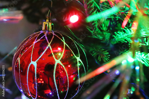 Christmas tree with new year decorations. New Year celebration. Selective soft focus. Background for postcards