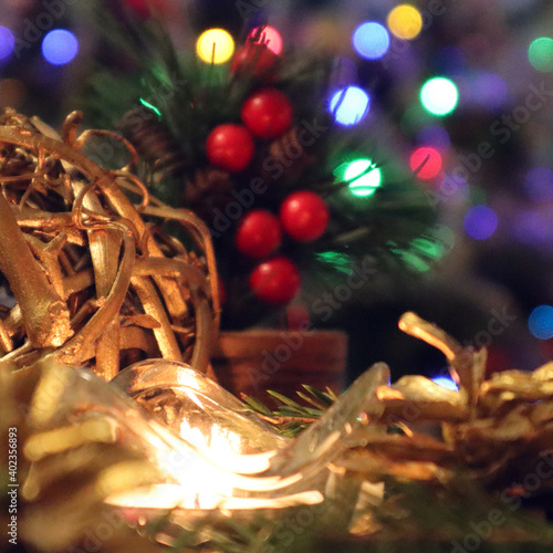 Christmas tree with new year decorations. New Year celebration. Selective soft focus. Background for postcards